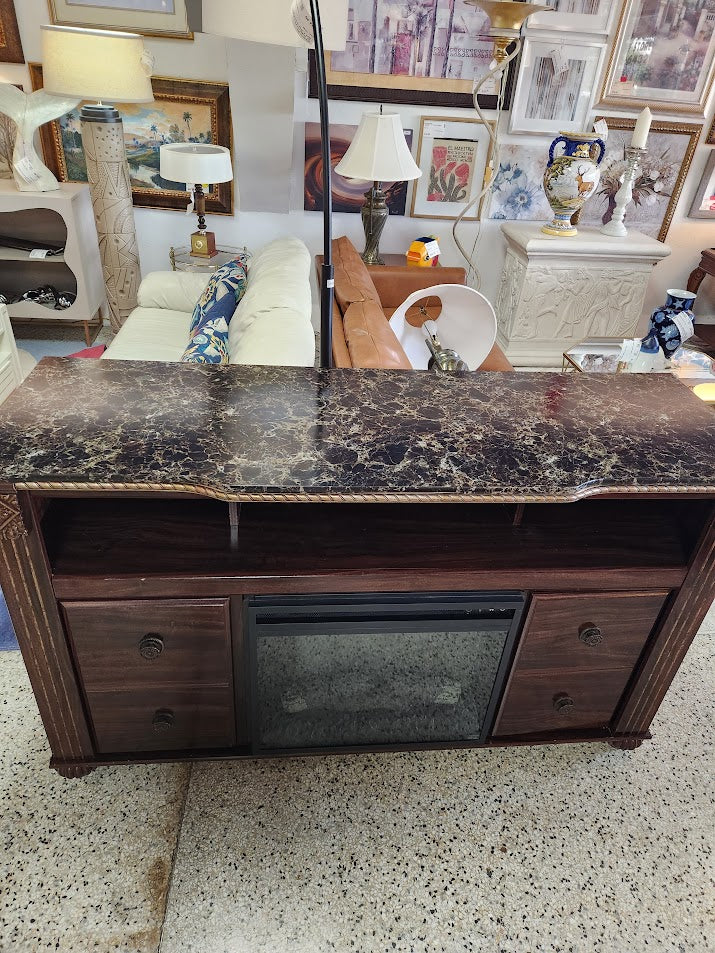 Ashley FurnitureDK Brown Console With Fireplace