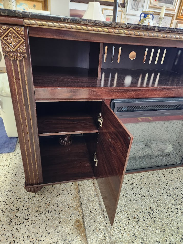 Ashley FurnitureDK Brown Console With Fireplace