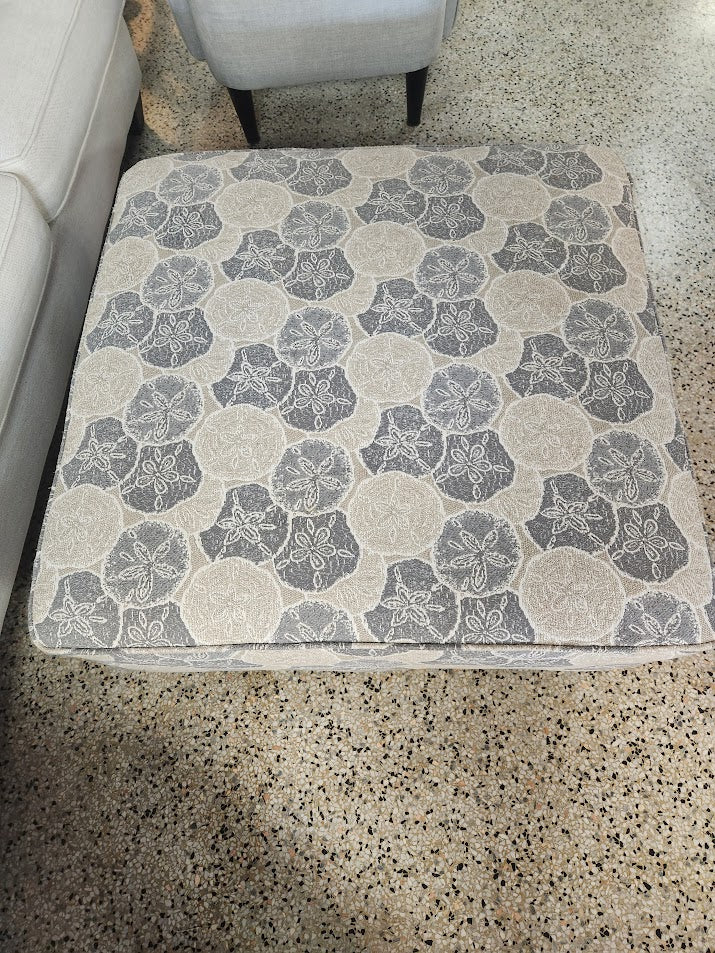 Coastal Sand Dollar Rooms to Go Ottoman