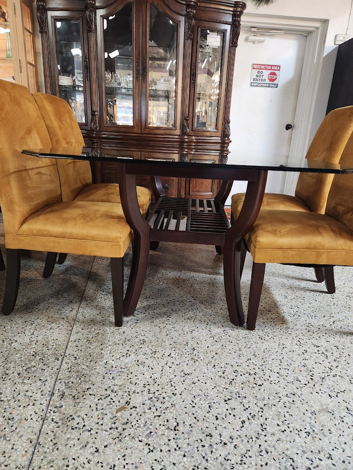 Glass top Dining Table+ 4 mustard armless chairs