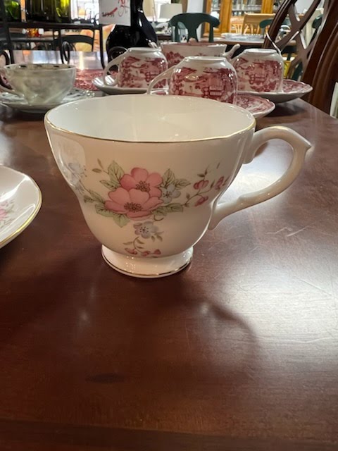 Tea cup and saucer, pink and purple flower