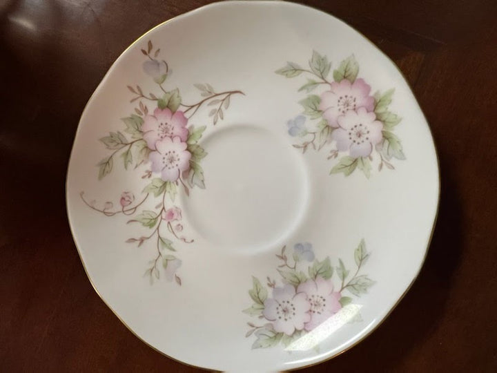 Tea cup and saucer, pink/purple flowers